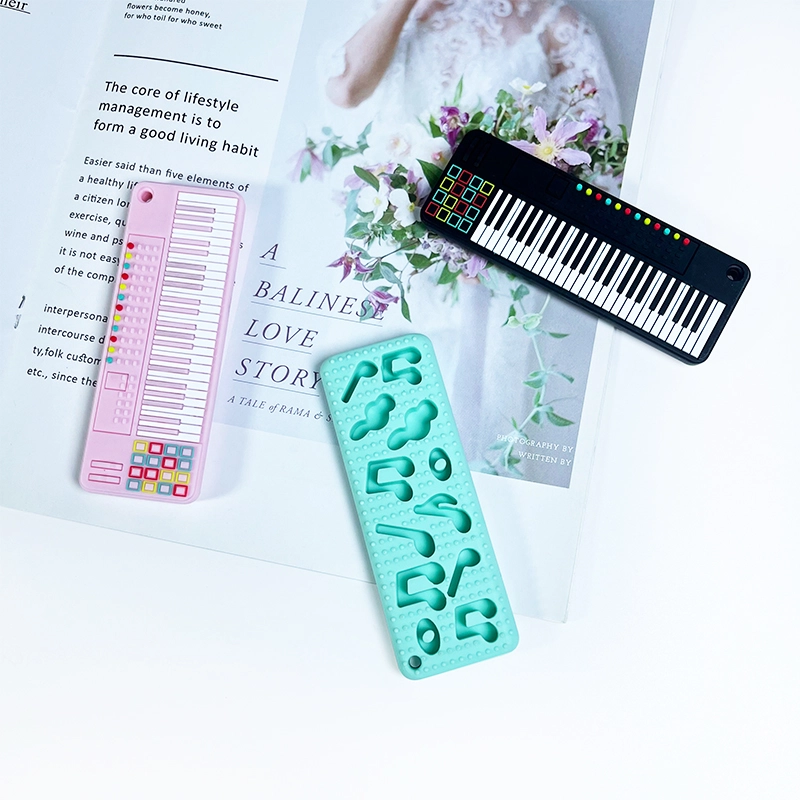 Piano-Shaped Silicone Baby Teether Piano-Shaped Silicone Baby Teether