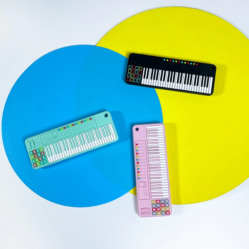 Piano-Shaped Silicone Baby Teether Piano-Shaped Silicone Baby Teether